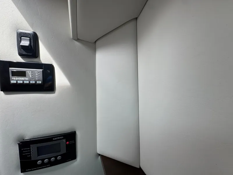 Slide: The Image of 2021 Cruisers Yachts 338 South Beach Edition Bow Rider interior controls. - 49