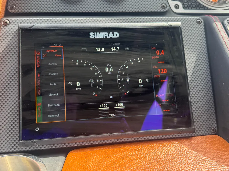 Slide: The Image of Simrad display on 2021 Cruisers Yachts 338 South Beach Edition Bow Rider dashboard. - 9