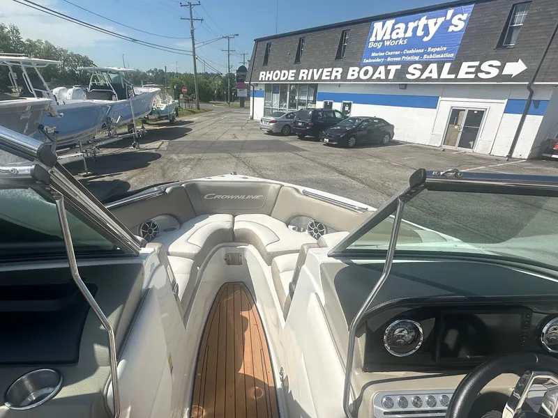 Slide: The Image of 2023 Crownline 240 SS boat at Rhode River Boat Sales dealership. - 24