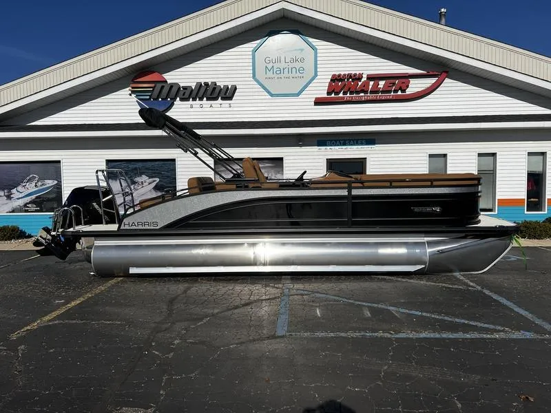 Slide: The Image of 2024 Harris Solstice 230 pontoon boat displayed at Gulf Lake Marine dealership. - 1