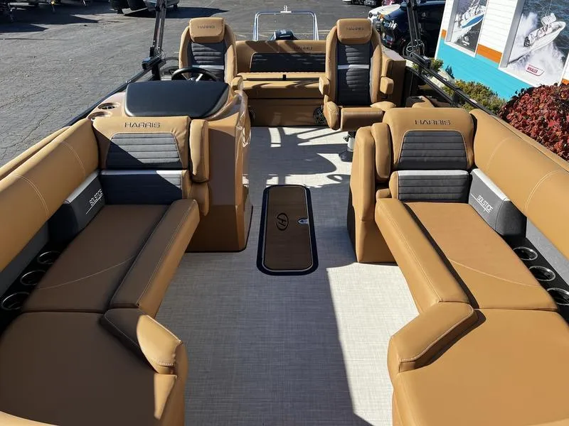 Slide: The Image of 2024 Harris Solstice 230 pontoon boat with luxurious tan and gray seating. - 9
