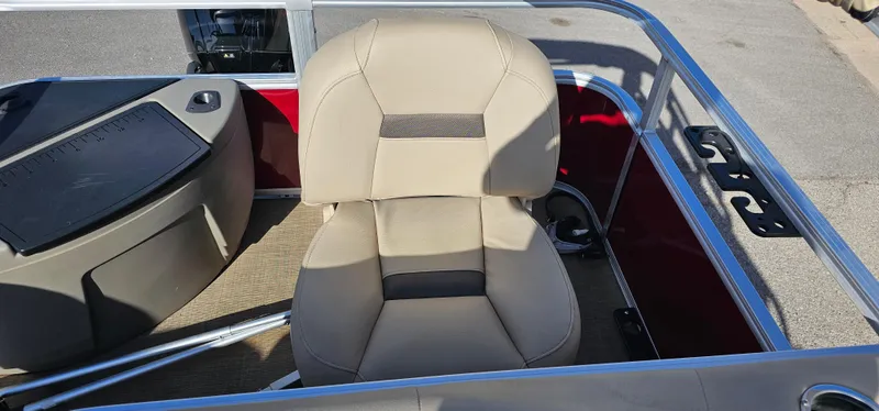 Slide: The Image of 2024 Sun Tracker BB-18 boat seat, beige upholstery, surrounded by metal railing. - 20
