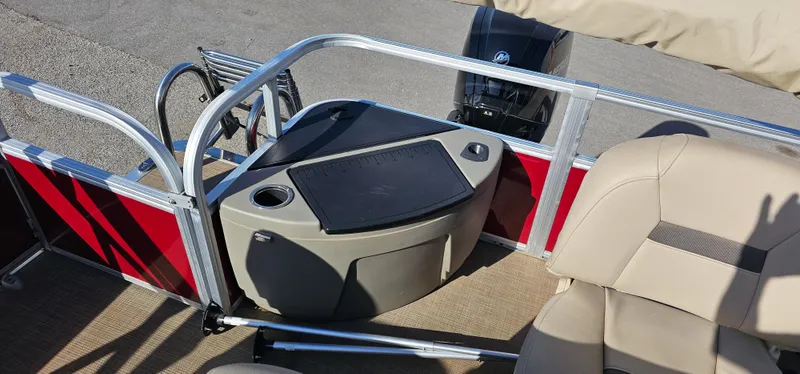 Slide: The Image of 2024 Sun Tracker BB-18 boat interior with seating and control panel. - 7