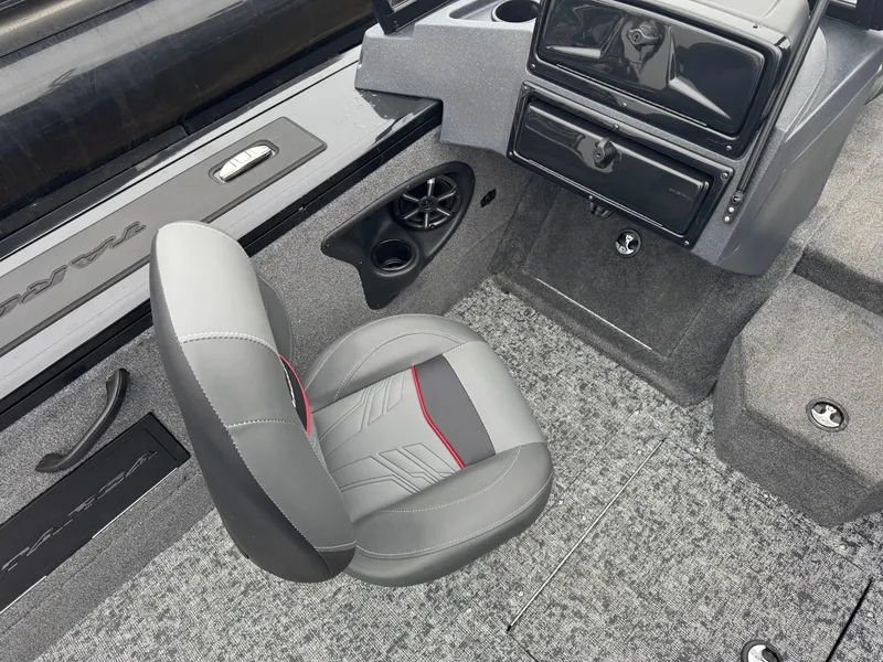 Slide: The Image of 2025 Tracker Targa V-18 Combo boat interior with gray seat and dashboard. - 11