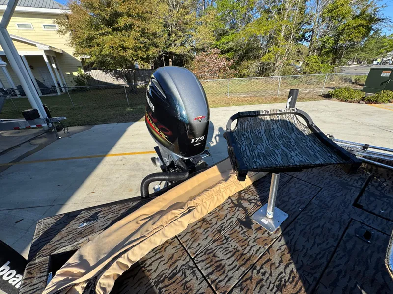 Slide: The Image of 2023 Xpress H22B boat with 175 horsepower engine, parked outdoors. - 33