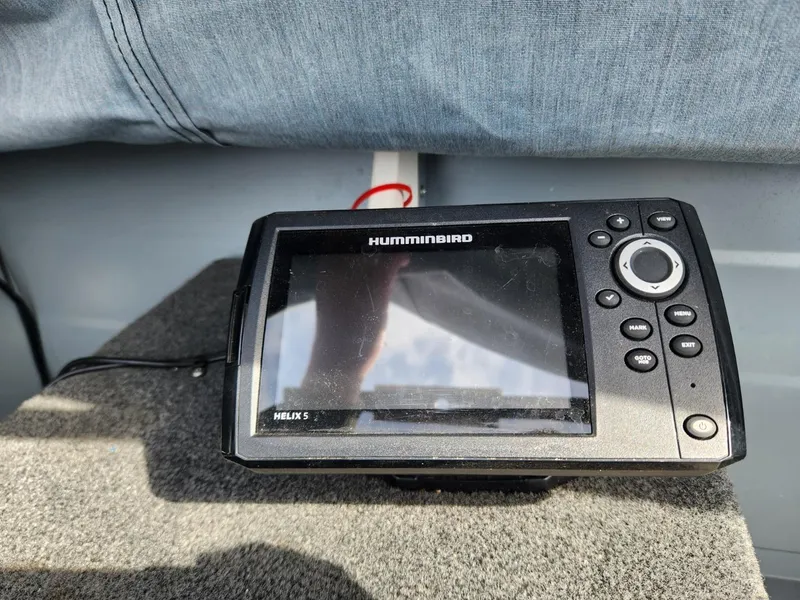 Slide: The Image of Fishfinder device on a 2021 Starcraft 16 SF DLX boat dashboard. - 5