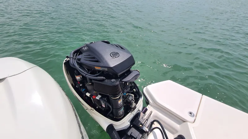 Slide: The Image of 2017 Sea Ray SLX 350 OB outboard motor on water. - 19