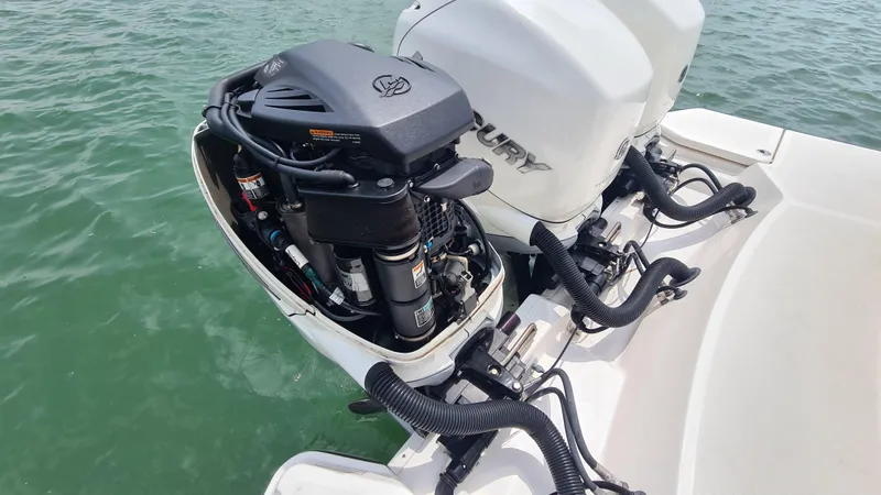Slide: The Image of 2017 Sea Ray SLX 350 OB outboard engines on water. - 23