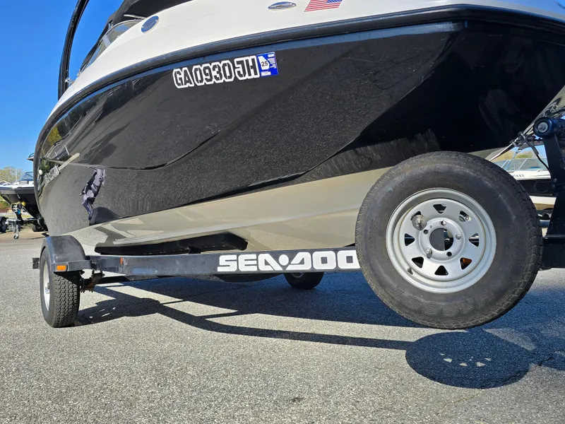Slide: The Image of 2012 Sea-Doo Challenger 180 on trailer, side view, sunny day. - 8