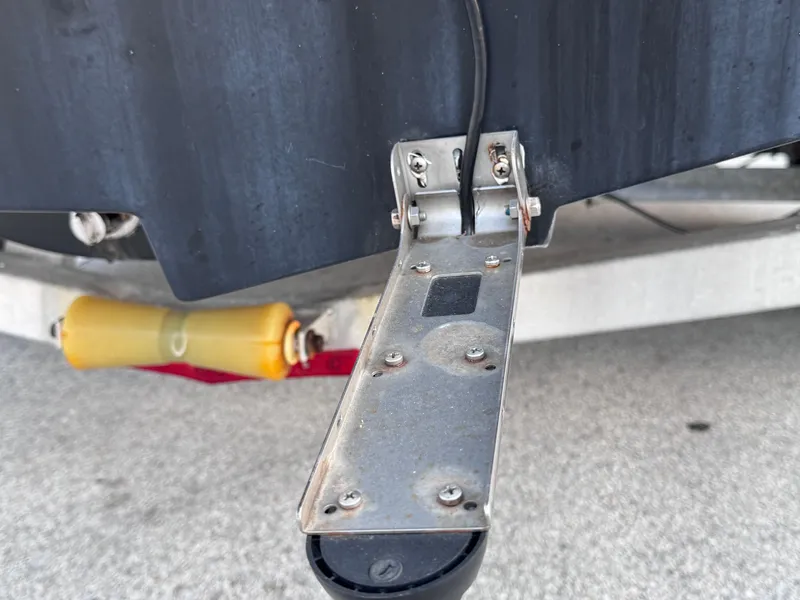 Slide: The Image of Transom mount on 2021 Carolina Skiff Ultra Elite 24 boat trailer. - 22