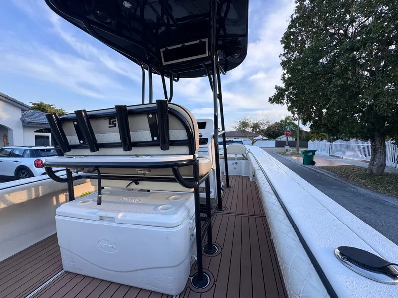 Slide: The Image of 2021 Carolina Skiff Ultra Elite 24 boat interior with seating and storage. - 32