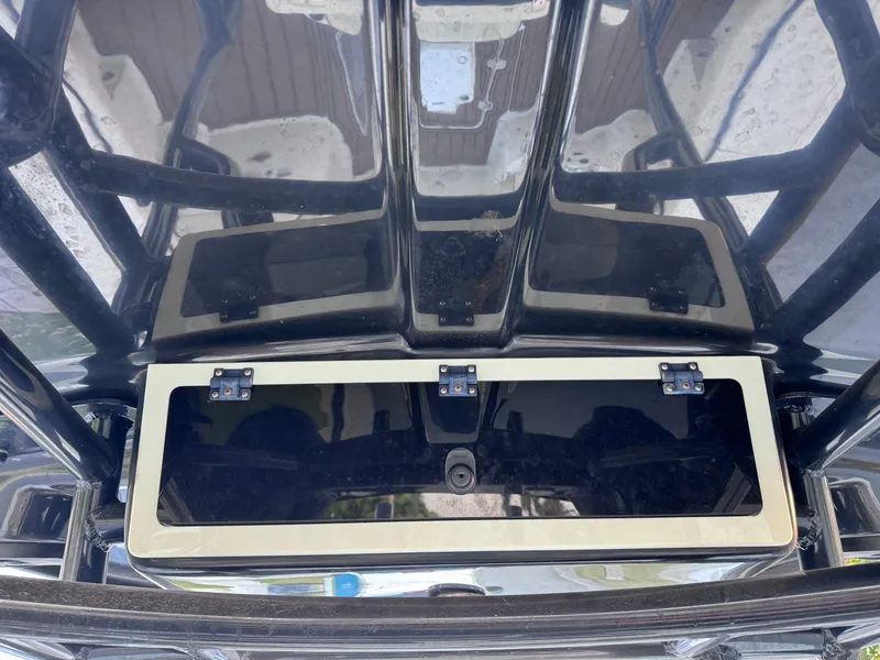 Slide: The Image of 2021 Carolina Skiff Ultra Elite 24 boat console with storage compartment. - 43