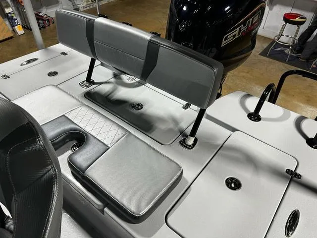 Slide: The Image of 2025 Blazer 675 Ultimate Bay boat interior with seating and storage compartments. - 13