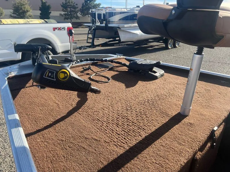 Slide: The Image of 2018 Tracker BASS TRACKER® 40th Anniversary Heritage Edition boat deck with seat and controls. - 12