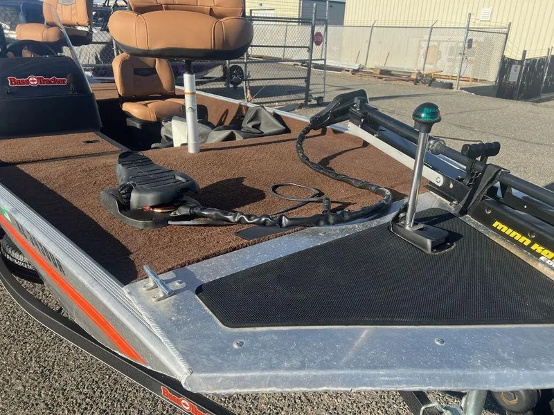 Slide: The Image of 2018 Tracker BASS TRACKER® 40th Anniversary Heritage Edition boat deck with fishing equipment. - 13