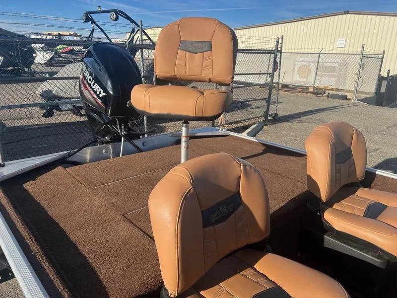 Slide: The Image of 2018 Tracker BASS TRACKER® 40th Anniversary Heritage Edition boat with tan seats and Mercury engine. - 9