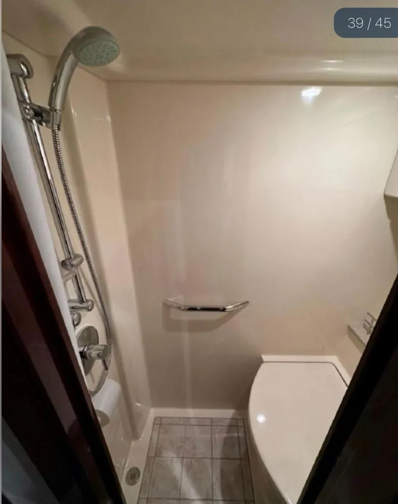 Slide: The Image of Floor plan of a 2011 Sea Ray 470 Sundancer yacht, showcasing interior layout and design. - 43