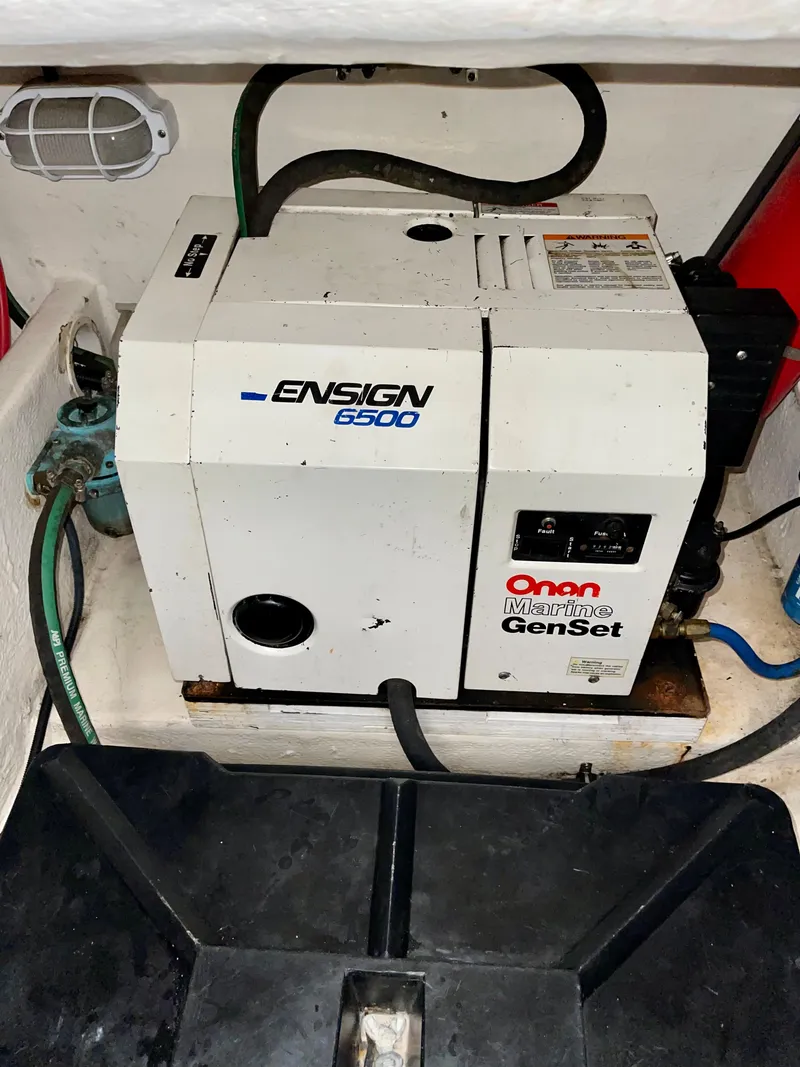 Slide: The Image of Onan Marine GenSet in 2005 Luhrs 30 Hard Top boat engine room. - 4