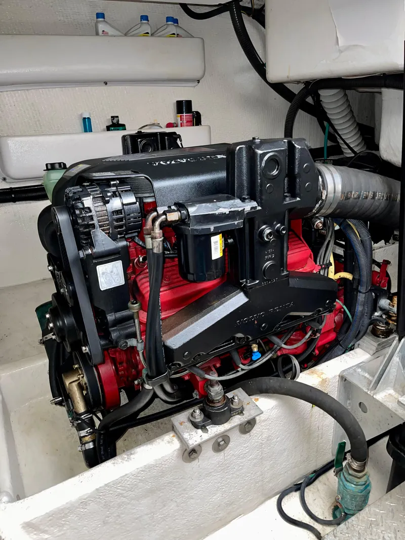 Slide: The Image of 2005 Luhrs 30 Hard Top engine compartment with visible components and wiring. - 5