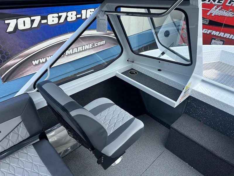 Slide: The Image of Interior of 2025 Duckworth 18 Advantage boat with seating and dashboard. - 22