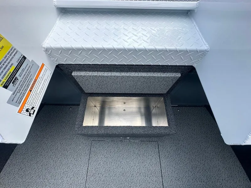 Slide: The Image of Interior view of 2025 Duckworth 18 Advantage boat with storage compartment. - 30