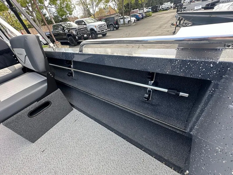 Slide: The Image of 2025 Duckworth 18 Advantage boat interior with rod holder and seating. - 33