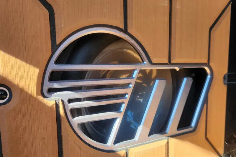 Slide: The Image of 2021 Malibu Wakesetter 24 MXZ speaker detail with sleek, modern design elements. - 16