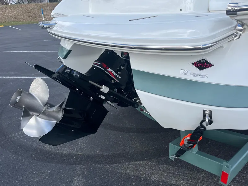 Slide: The Image of Rear view of 2002 Cobalt 246 boat with outboard motor and propeller. - 5