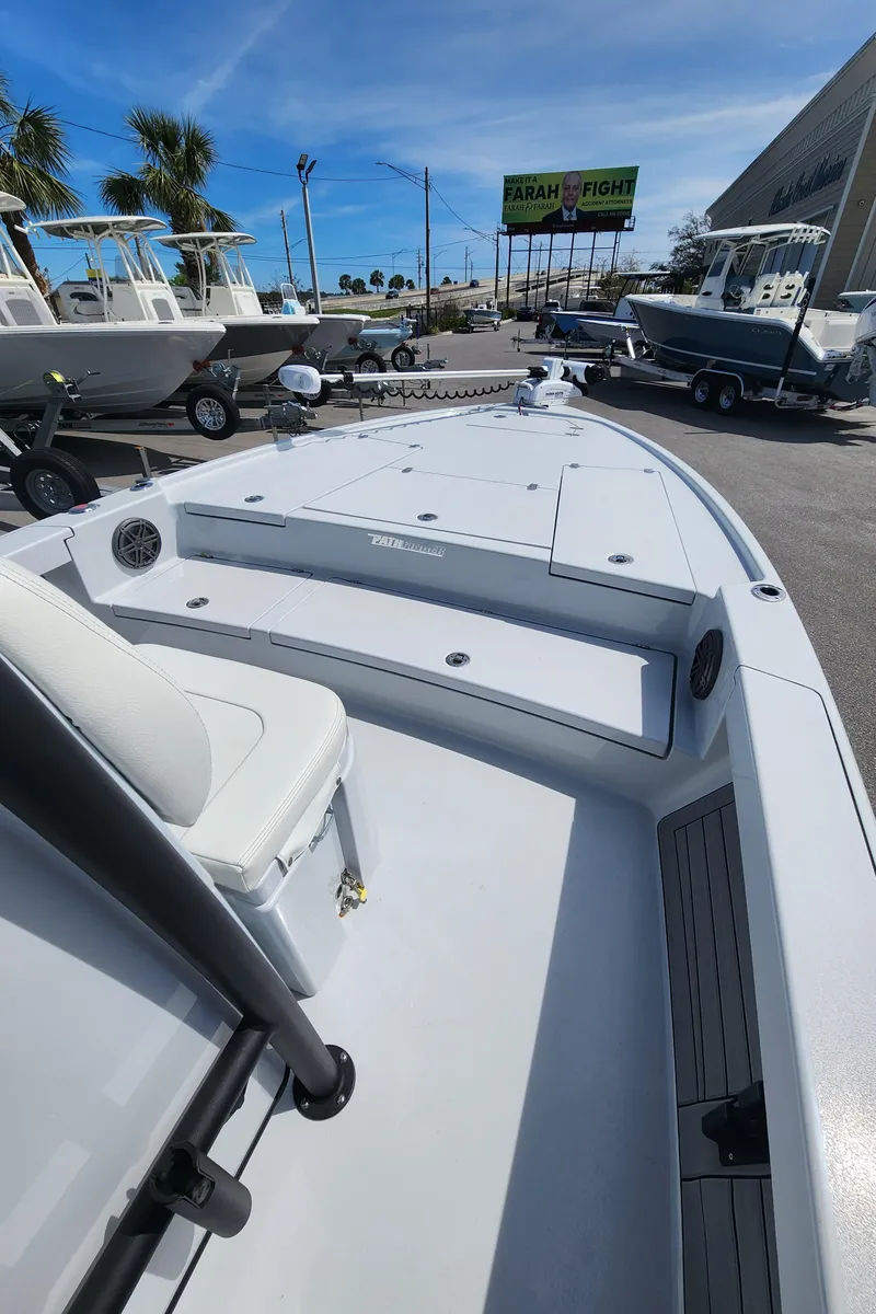Slide: The Image of 2023 Pathfinder 2500 Hybrid boat on display, featuring sleek design and spacious deck. - 17