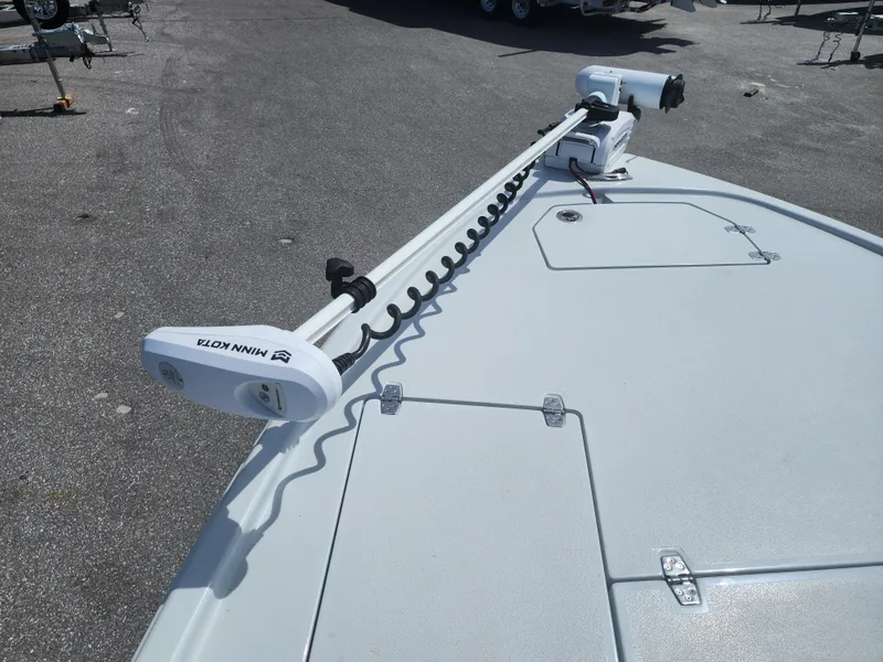 Slide: The Image of 2023 Pathfinder 2500 Hybrid boat with Minn Kota trolling motor on deck. - 26