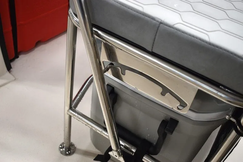 Slide: The Image of 2025 Carolina Skiff E20 JVX Center Console seat detail with stainless steel frame. - 23