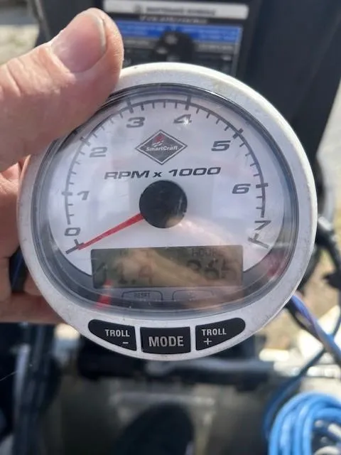 Slide: The Image of Close-up of a Sun Tracker Party Barge 20 DLX 2017 tachometer showing RPM. - 10