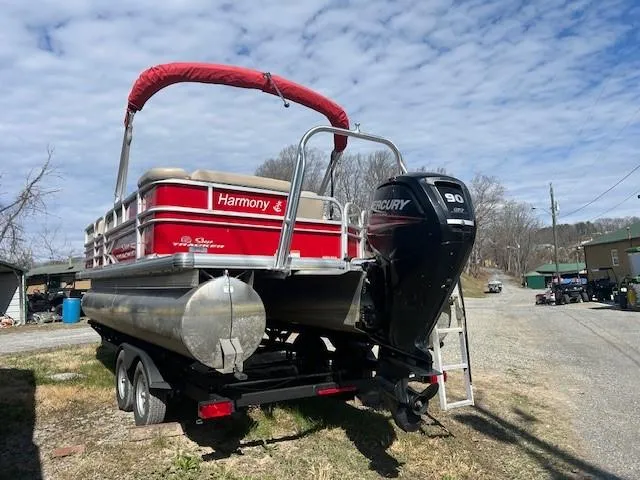 Slide: The Image of 2017 Sun Tracker Party Barge 20 DLX with Mercury engine on trailer. - 6