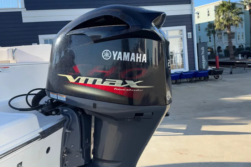 Slide: The Image of Yamaha VMAX outboard motor on 2021 Robalo R230 Center Console boat, dockside view. - 5
