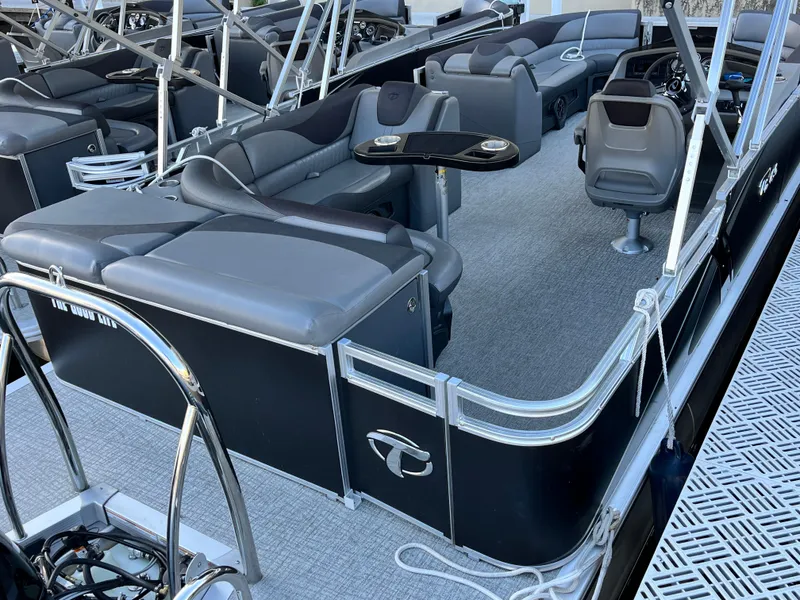 Slide: The Image of 2023 Tahoe Pontoon LTZ Cruise with sleek seating and modern design. - 2