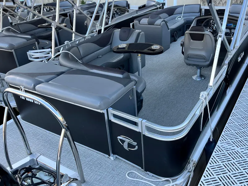 Slide: The Image of 2023 Tahoe Pontoon LTZ Cruise with sleek seating and modern interior design. - 3