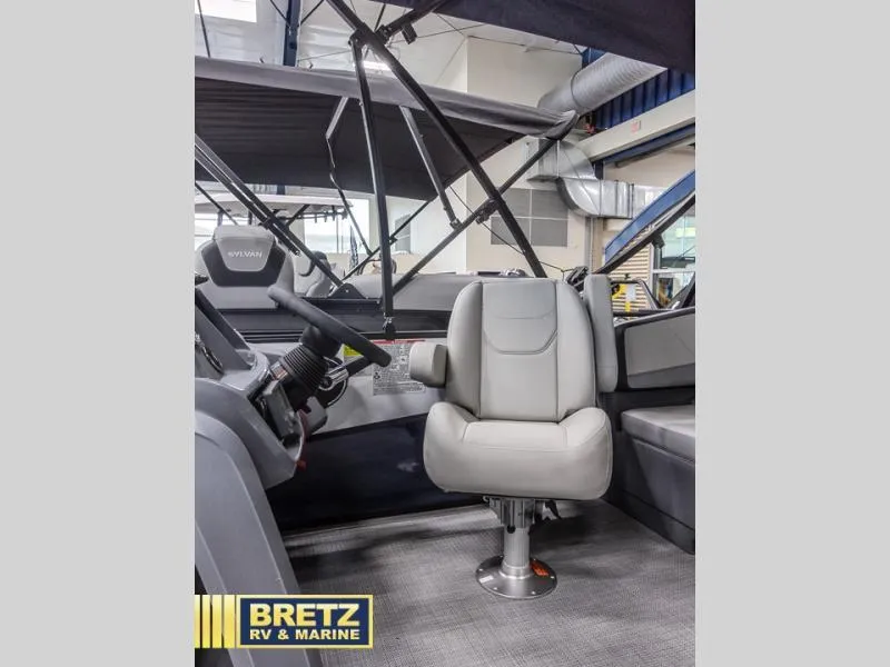 Slide: The Image of Captain's chair in a 2025 A-Series A20 LZ DH boat at Bretz RV & Marine showroom. - 12