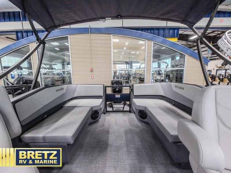 Slide: The Image of Interior of a 2025 A-Series A20 LZ DH pontoon boat at Bretz RV & Marine showroom. - 14