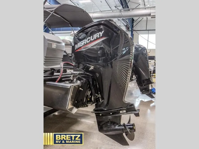Slide: The Image of Mercury outboard motor on display at Bretz RV & Marine showroom, 2025 A-Series A20 LZ DH model. - 6
