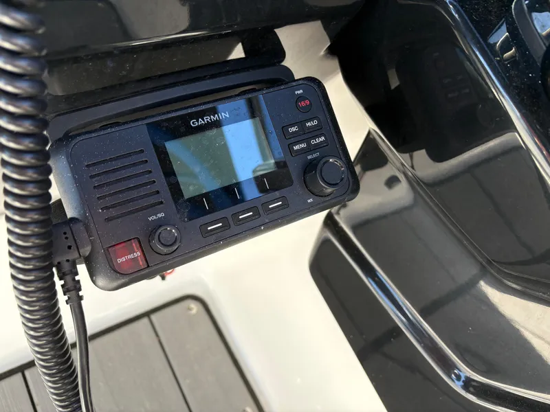 Slide: The Image of Garmin marine radio on 2019 Yamaha Boats 242X E-Series dashboard. - 15