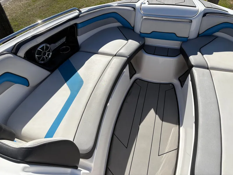 Slide: The Image of 2019 Yamaha Boats 242X E-Series interior with sleek seating and modern design. - 20