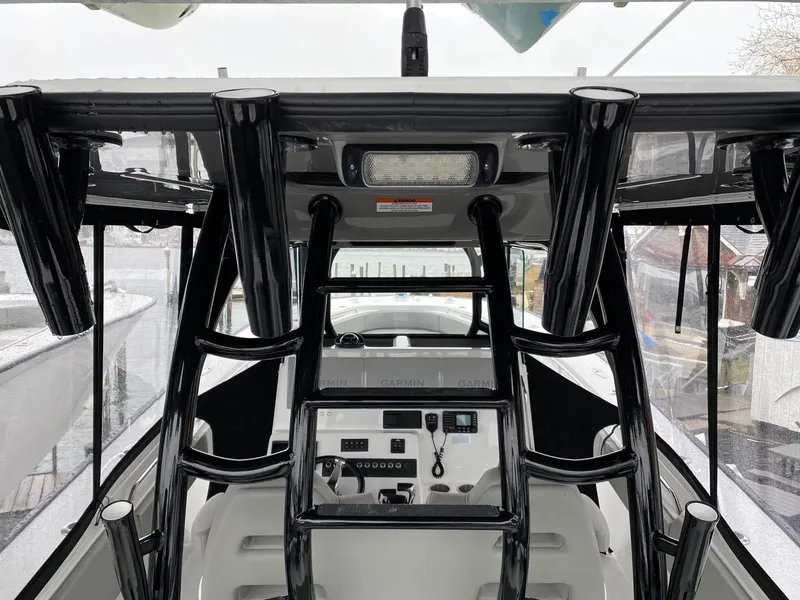 Slide: The Image of 2022 Cape Horn 36 XS boat interior with modern controls and sleek design. - 12