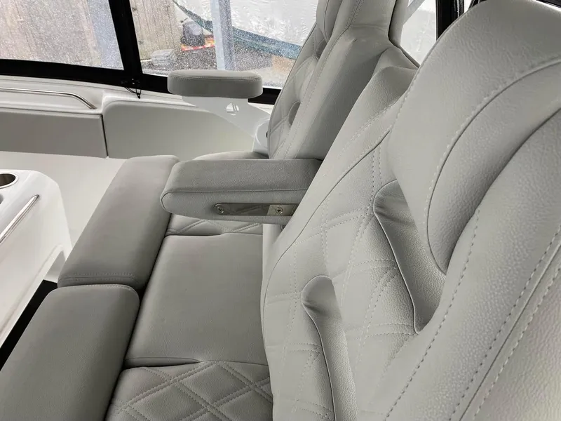 Slide: The Image of Luxurious seating in 2022 Cape Horn 36 XS boat with elegant gray upholstery. - 9