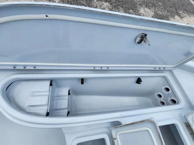 Slide: The Image of Open storage compartment in 2024 Blue Wave 2000 Classic boat. - 13