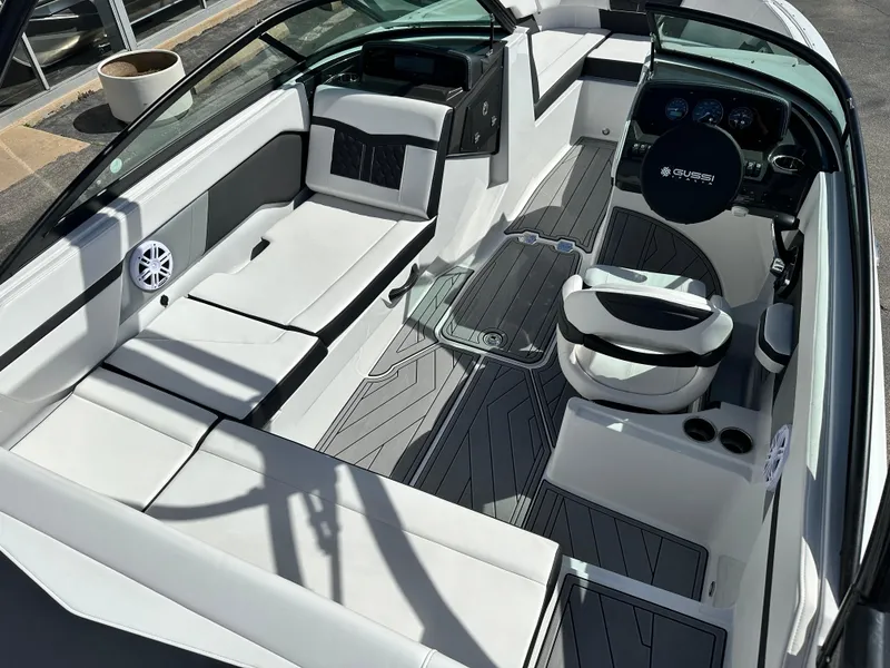 Slide: The Image of 2025 Monterey M22 boat interior with sleek seating and modern dashboard design. - 5