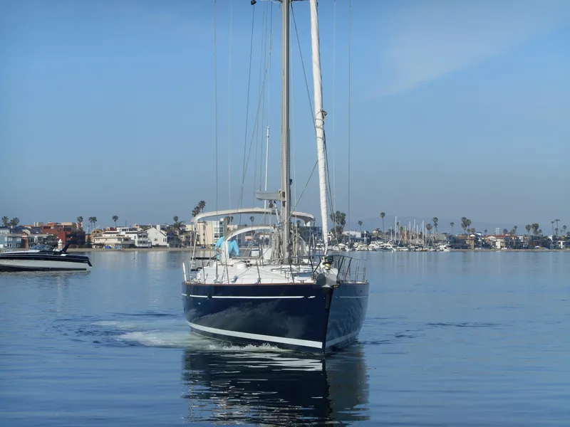 Slide: The Image of Sailing yacht Beneteau Oceanis 50, 2000 model, cruising in a calm marina. - 15