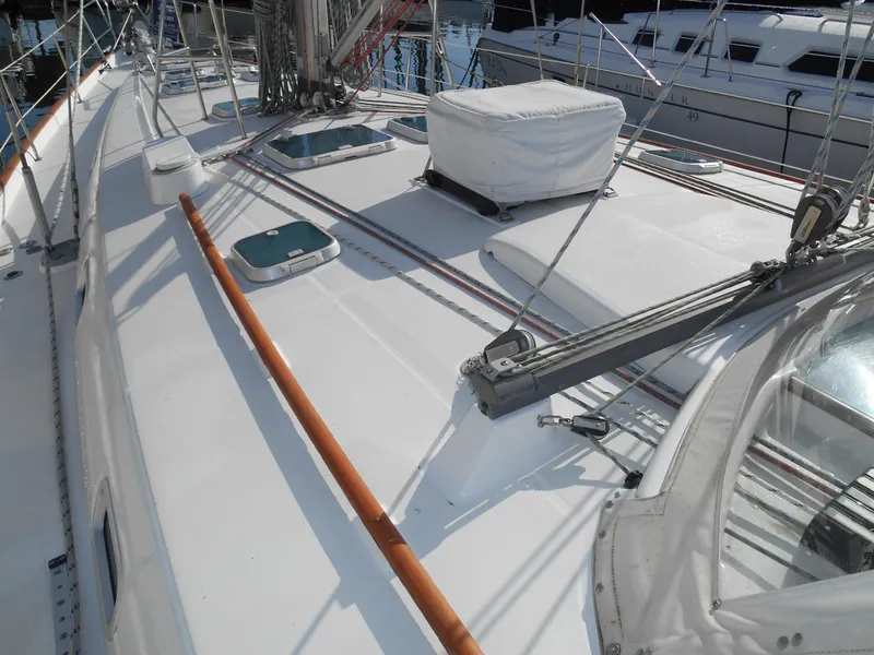 Slide: The Image of Beneteau Oceanis 50 sailboat deck, 2000 model, featuring sleek design and modern fittings. - 22
