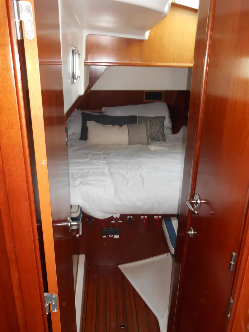 Slide: The Image of Cozy cabin interior of 2000 Beneteau Oceanis 50 sailboat with wooden finish. - 39