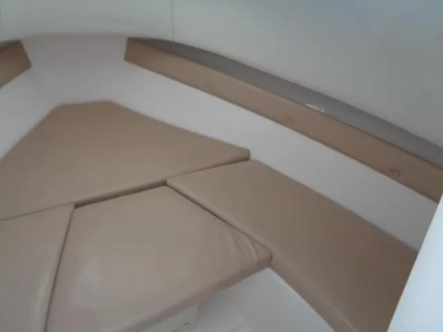 Slide: The Image of 2007 Century 2200 Walkaround cabin interior with beige cushions. - 5