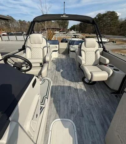 Slide: The Image of 2025 Crest Caribbean 230 boat interior with luxurious seating and modern design. - 3